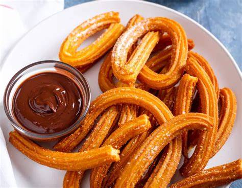 Tradiční španělské churros s čokoládou