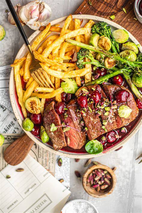 Steak s portskou omáčkou višněmi a pistáciemi